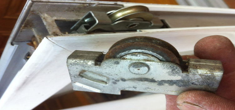 screen door roller repair in West Lealman